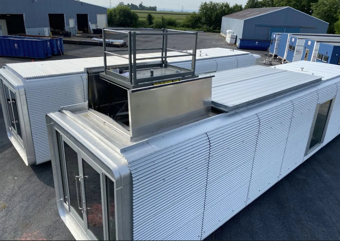 Pod rooftop with hatch railing and corrugated siding